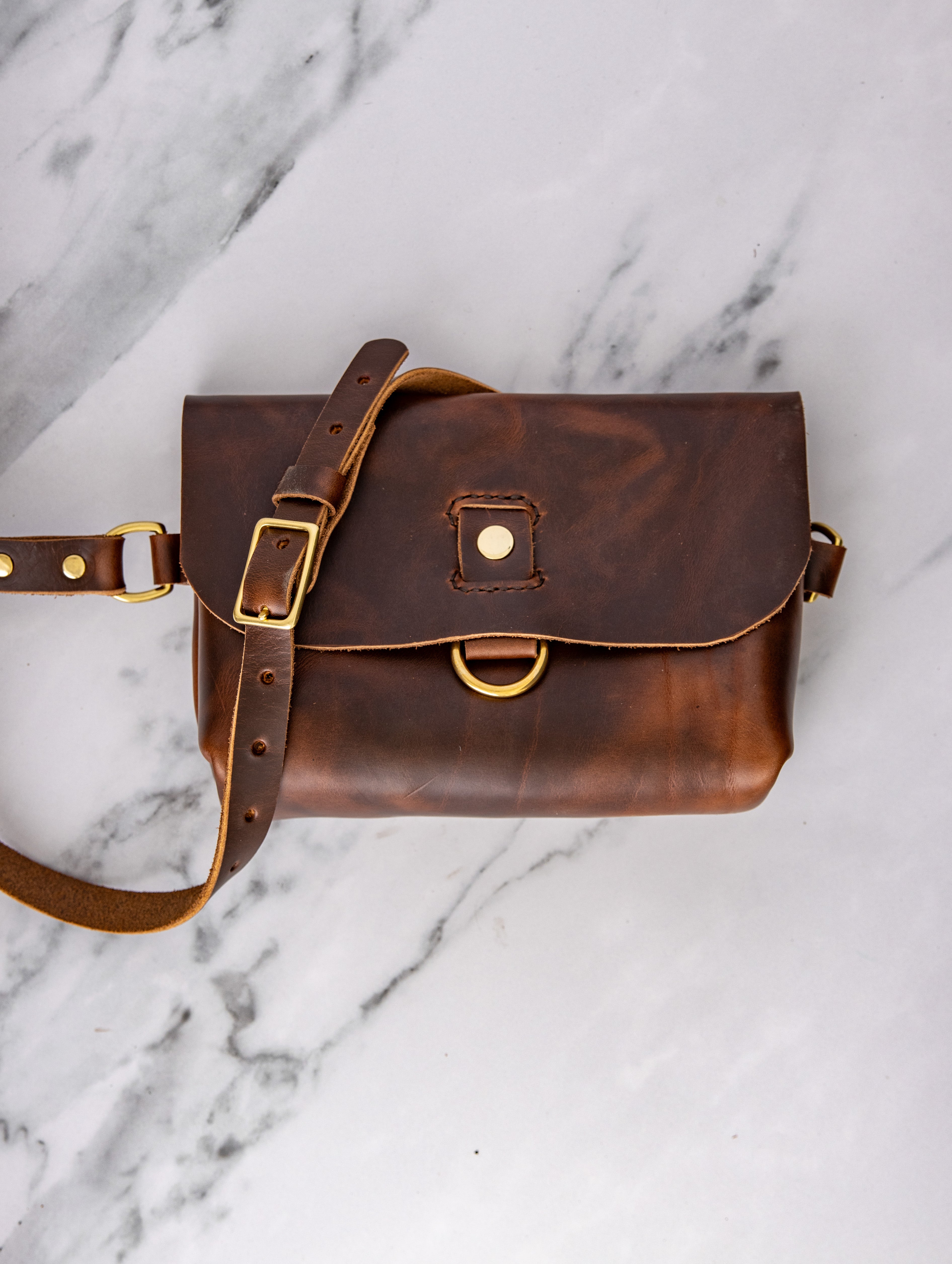 Vintage leather sling on sale bag